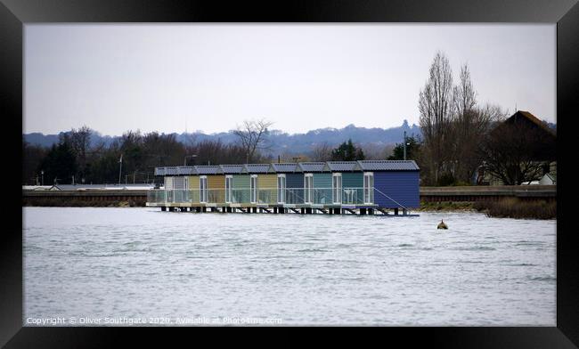 Beach Huts from the water Framed Print by Oliver Southgate