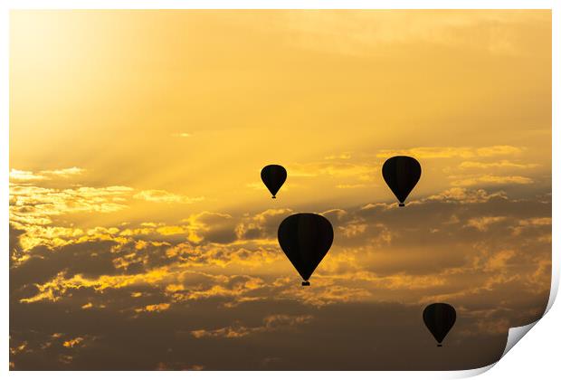 some hot air balloons in the sky with orange sunrise clouds Print by David Galindo