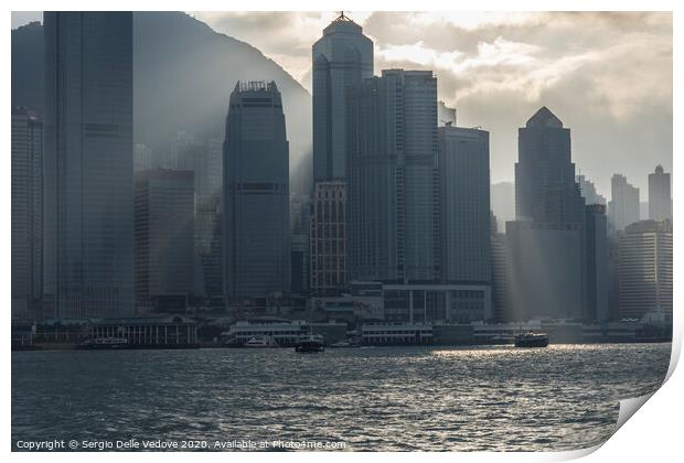 Victoria harbor in Hong Kong Print by Sergio Delle Vedove