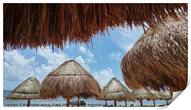 View of ocean through Sunshades at sandy beach in Mexico Print by PhotOvation-Akshay Thaker