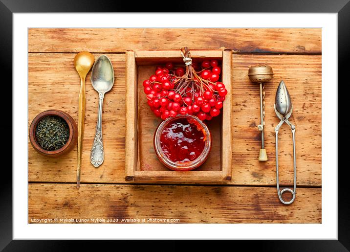Berry jam in a jar Framed Mounted Print by Mykola Lunov Mykola