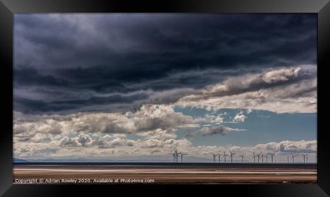 Storm clouds over The Mersey Framed Print by Adrian Rowley