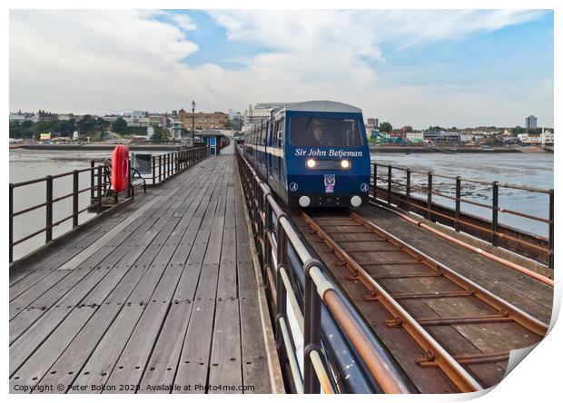 A train makes it way along the pier at Southend on Sea, Essex, UK Print by Peter Bolton