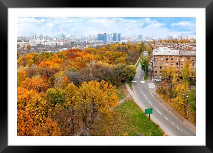 Bright orange foliage of the city park in the autumn landscape of the city, view from the top. Framed Mounted Print by Sergii Petruk