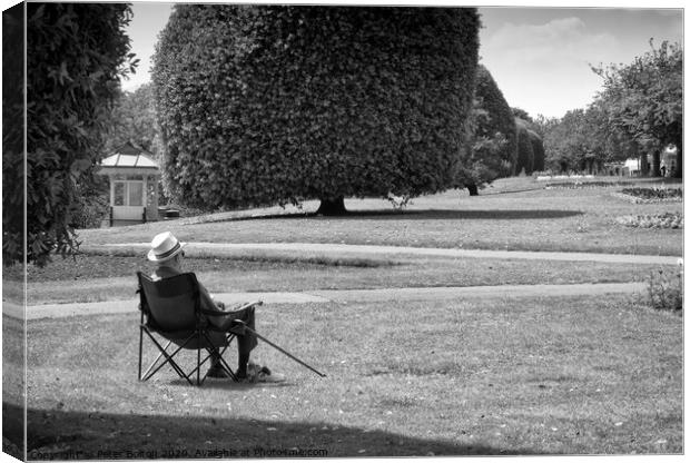 An old man sits and appreciates the view. Embankment Gardens, at Southend on Sea, Essex. Canvas Print by Peter Bolton