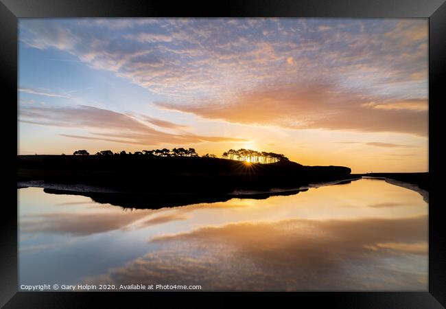 Sunrise over the iconic treeline at Budleigh Salterton Framed Print by Gary Holpin