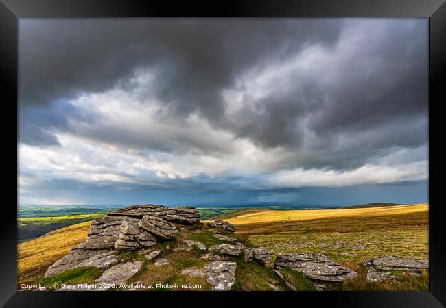 Stormy skies over Black Tor, Dartmoor Framed Print by Gary Holpin