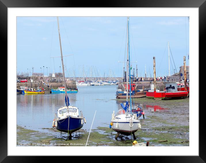 The harbour looking out to the Marina at Brixham, in Devon. Framed Mounted Print by john hill