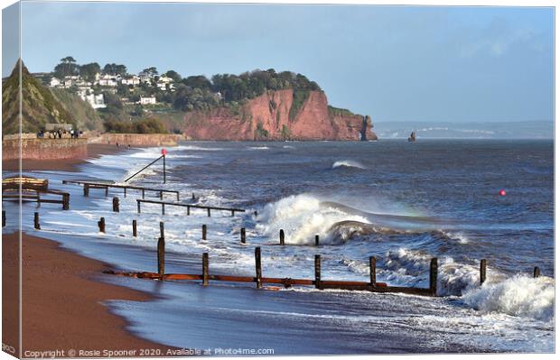 The waves roll in on Teignmouth Beach in South Devon Canvas Print by Rosie Spooner