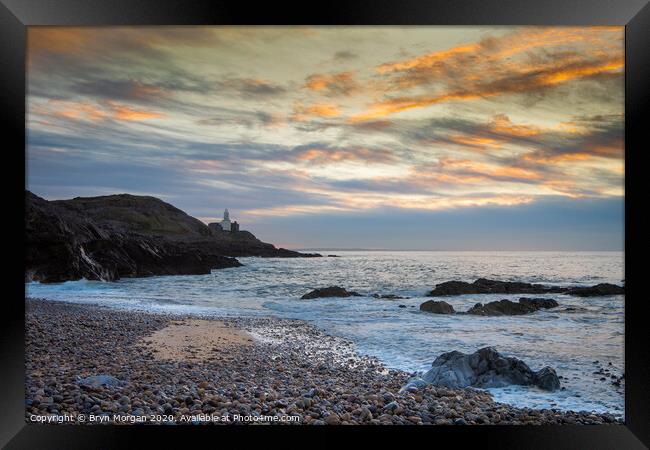 Mumbles lighthouse viewed from Bracelet bay Framed Print by Bryn Morgan