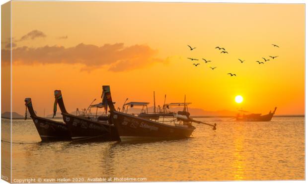 Boats and birds at sunrise Canvas Print by Kevin Hellon