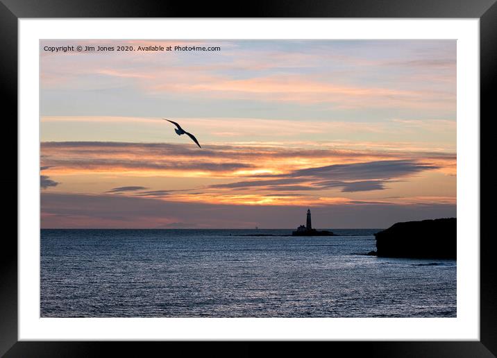 An early bird over St Mary's Island Framed Mounted Print by Jim Jones