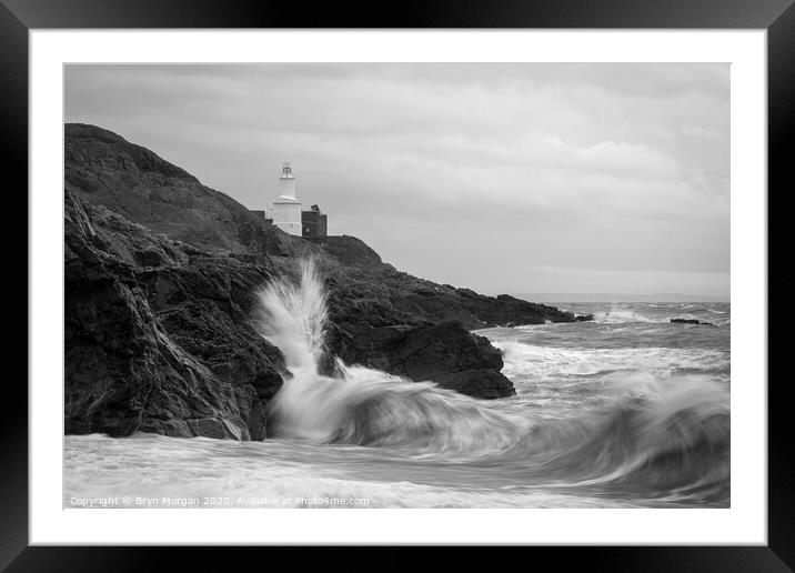 Mumbles lighthouse viewed from Bracelet bay, monochrome Framed Mounted Print by Bryn Morgan