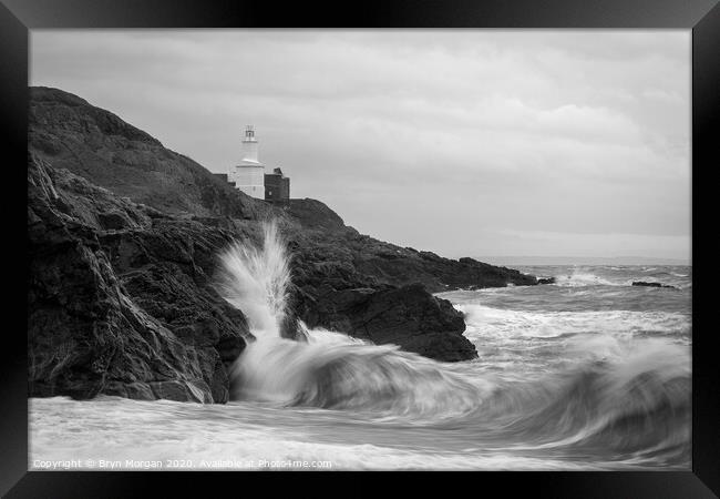 Mumbles lighthouse viewed from Bracelet bay, monochrome Framed Print by Bryn Morgan