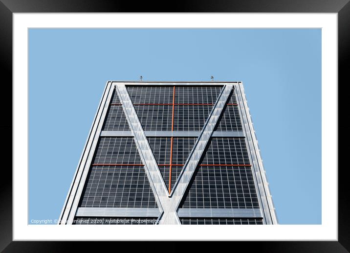 Low angle view of The Gate of Europe towers against blue sky Framed Mounted Print by Juan Jimenez