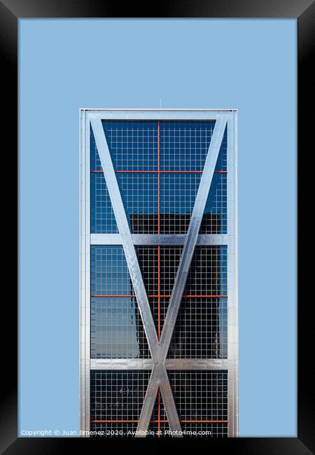 Low angle view of The Gate of Europe towers against blue sky Framed Print by Juan Jimenez