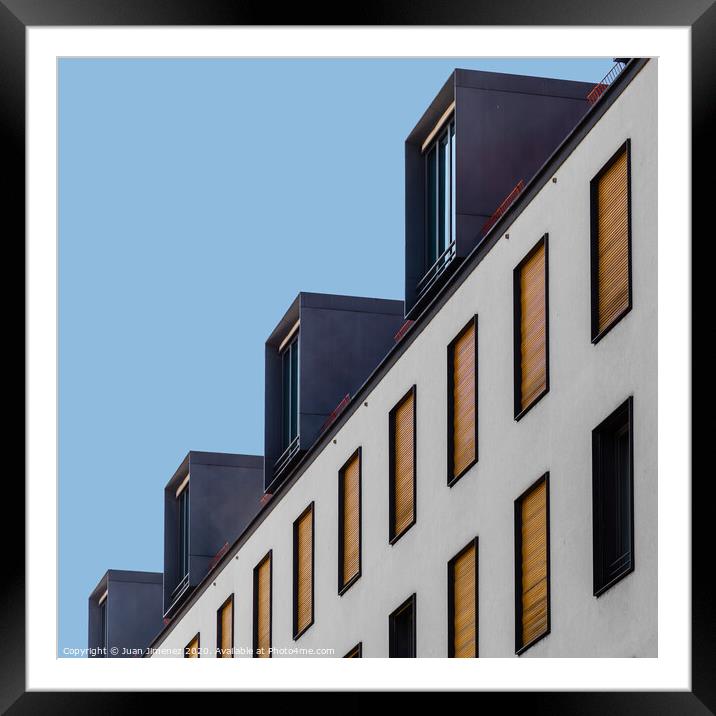 Low angle view of modern apartment building Framed Mounted Print by Juan Jimenez
