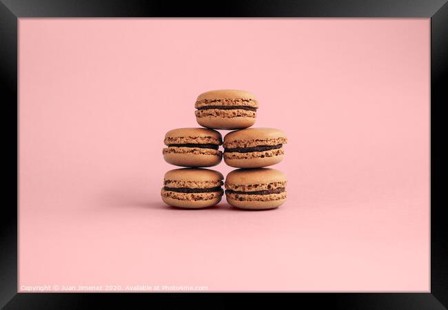 Macaroons isolated on pink background  Framed Print by Juan Jimenez