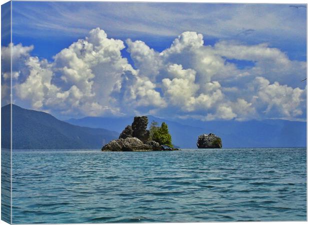 clouds and coral islands Canvas Print by John Lusikooy