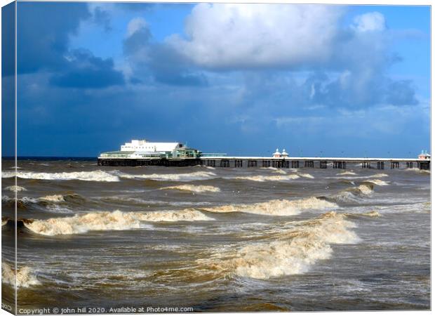 Stormy seas at Blackpool North pier. Canvas Print by john hill