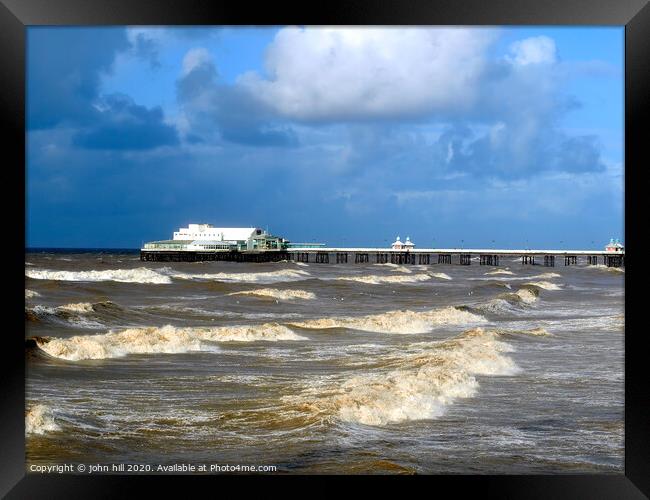 Stormy seas at Blackpool North pier. Framed Print by john hill
