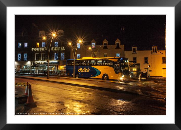A citylink bus from Glasgow arrives in Portree. Framed Mounted Print by Richard Smith