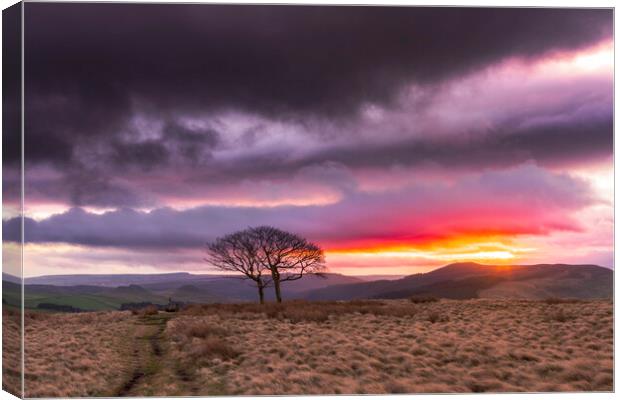 Sunrise over Winhill from Crookstone.  Canvas Print by John Finney