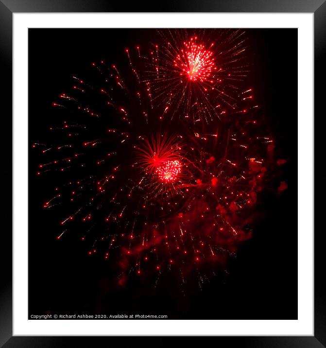 Red fireworks explode Framed Mounted Print by Richard Ashbee