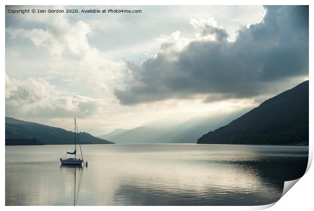 Solitary Boat on a tranquil Loch Tay Perthshire Scotland Print by Iain Gordon