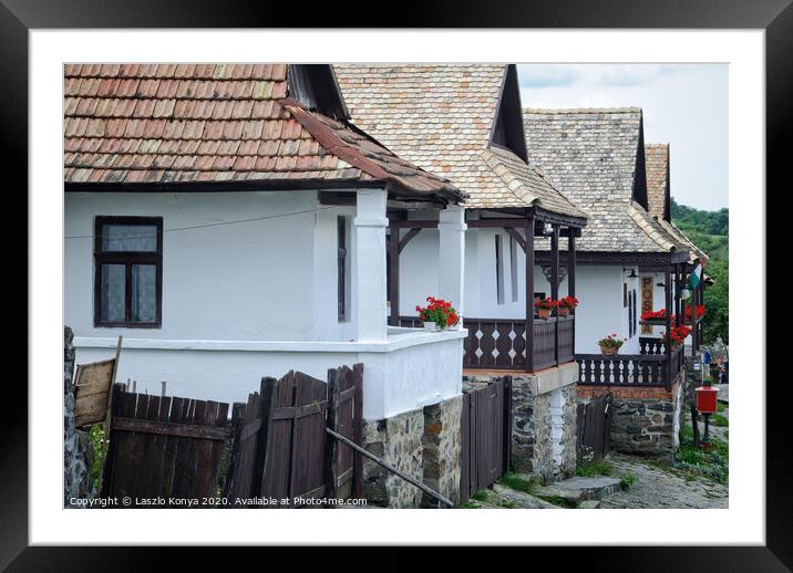 Farmhouses - Holloko Framed Mounted Print by Laszlo Konya