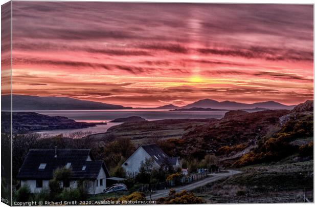 A light pillar rising beyond the Outer Hebrides. Canvas Print by Richard Smith