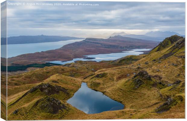 Lochan on the Trotternish ridge, Isle of Skye Canvas Print by Angus McComiskey