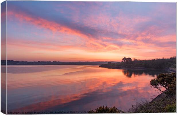 Sunrise reflections on the river Camel Canvas Print by Simon Maycock