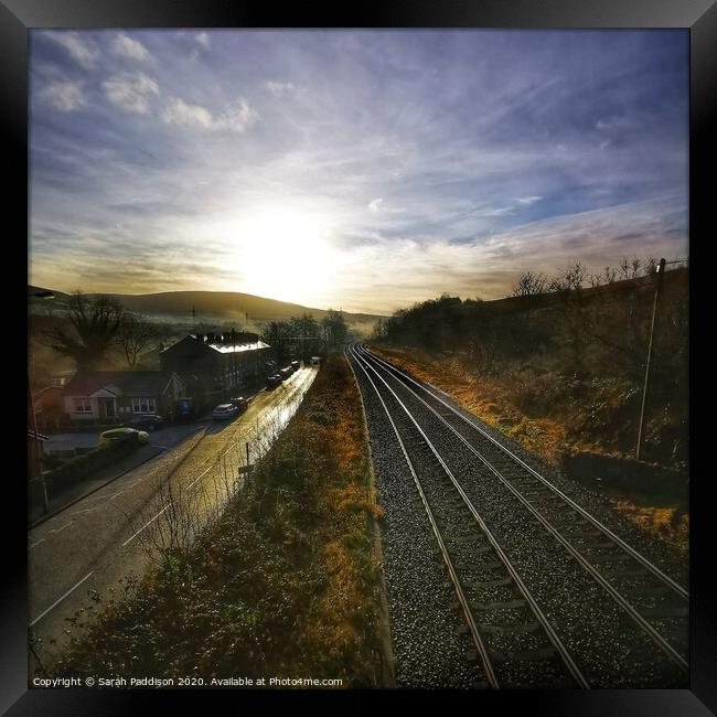 Rail and road at sunrise, Mossley Framed Print by Sarah Paddison