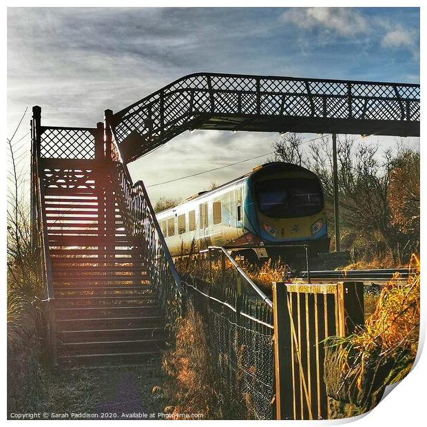 Iron railway bridge with train, Mossley Print by Sarah Paddison