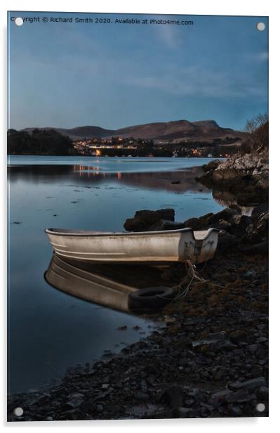 A dinghy moored on the shore of loch Portree reflected in the water  Acrylic by Richard Smith