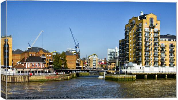 The entrance to Limehouse Marina from the River Thames, London. Canvas Print by Peter Bolton