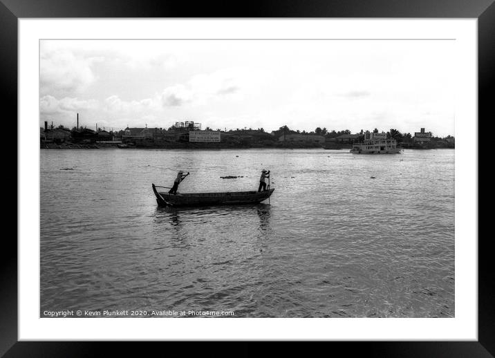 Saigon River Vietnam Framed Mounted Print by Kevin Plunkett