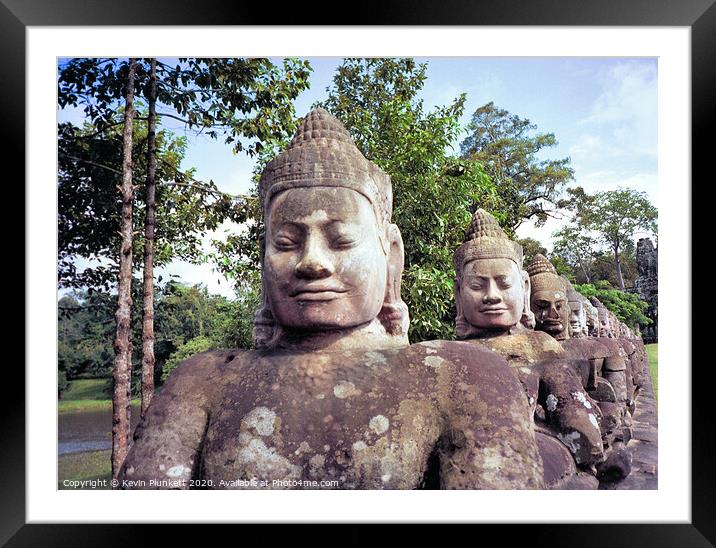 Statues of Angkor Wat, Cambodia  Framed Mounted Print by Kevin Plunkett