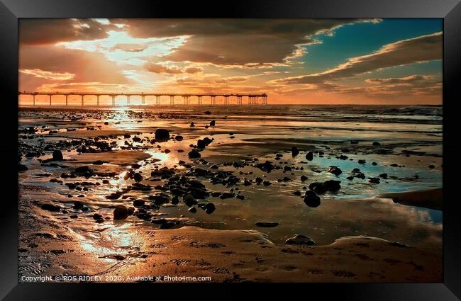 Angel light over Saltburn Beach Framed Print by ROS RIDLEY