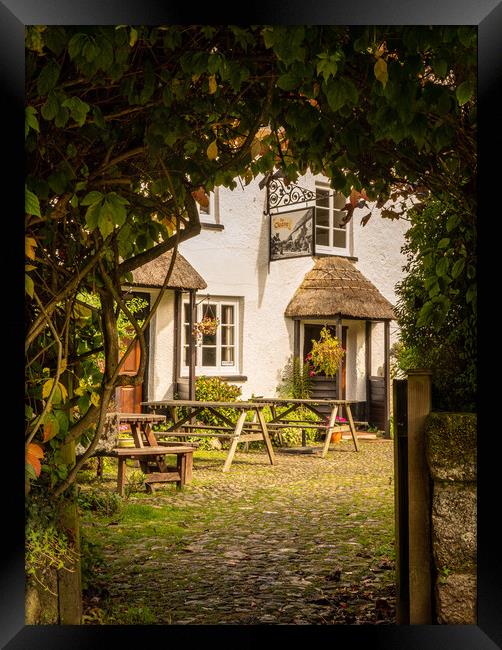 Thatched pub garden in Lustleigh in Devon Framed Print by Steve Heap