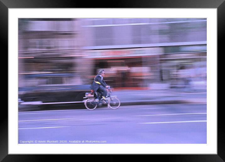 Speed King on a bicycle  Framed Mounted Print by Kevin Plunkett