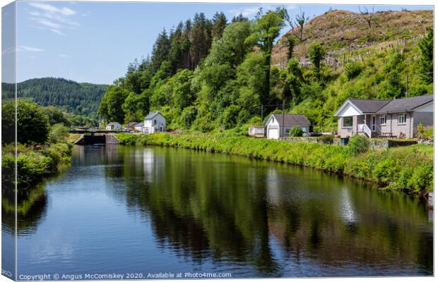 Cairnbaan Village on the Crinan Canal in Scotland Canvas Print by Angus McComiskey