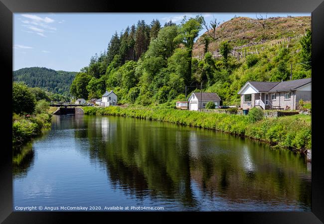 Cairnbaan Village on the Crinan Canal in Scotland Framed Print by Angus McComiskey
