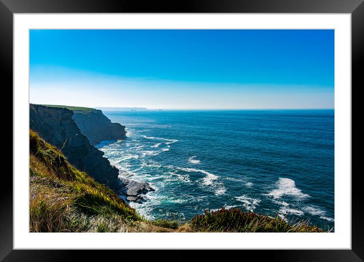 coastline cut into the ocean with boats and lighthouse Cabo Mayor Framed Mounted Print by David Galindo