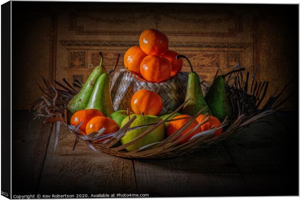 A hat full of fruit Canvas Print by Kev Robertson
