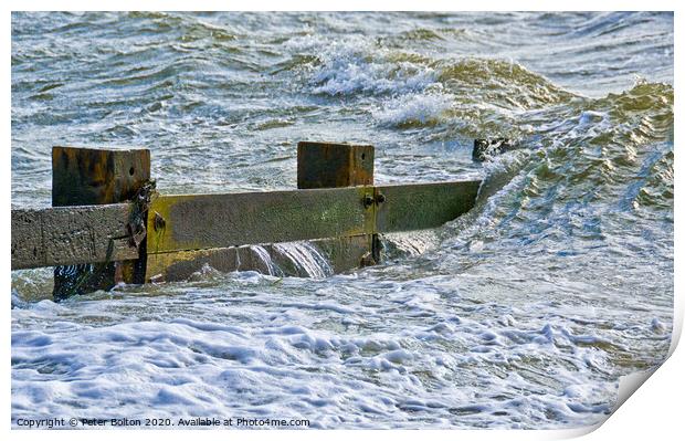 Waves break over a wooden groyne at Southend on Sea, Essex, UK Print by Peter Bolton