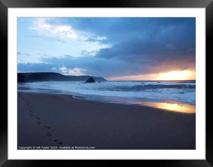 Footprints in the sand Framed Mounted Print by Nik Taylor