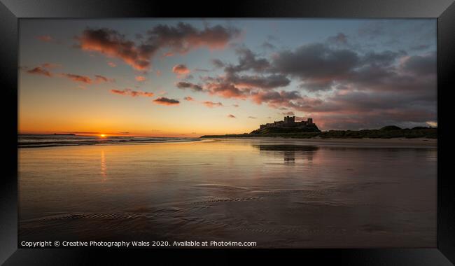 Bamburgh Castle Coastal Lanbdscape Framed Print by Creative Photography Wales