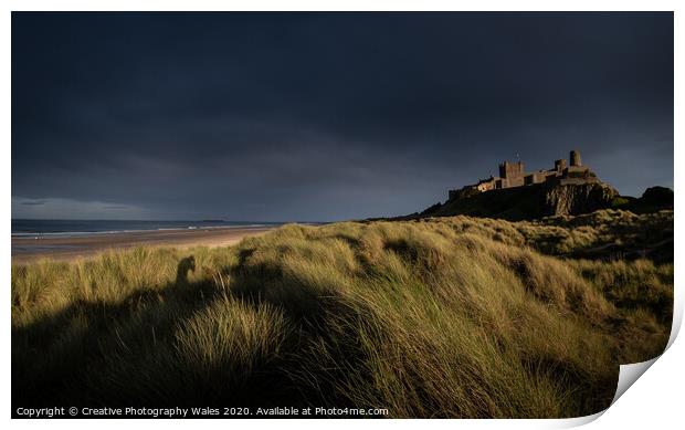 Bamburgh Castle on the Northumberland Coast Print by Creative Photography Wales